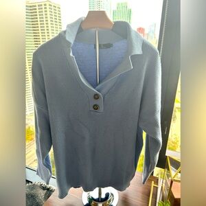 Woman’s v-neck, collared sweater;  light blue;  XL